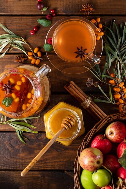 Autumn tea with berries and honey