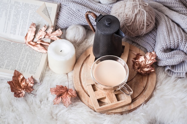 Autumn-winter Cozy home still Life with a Cup of hot drink.