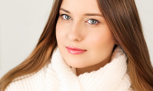 Autumn winter fashion and knitwear beautiful woman wearing warm knitted scarf