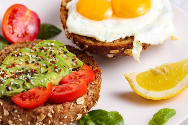 Avocado brunch. Egg toast on bread. Vegan Sandwich