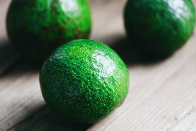 Avocado fruit on wooden