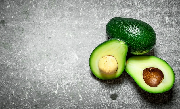 Avocado green on the stone table.