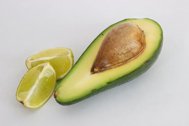 avocado and lime on a white background