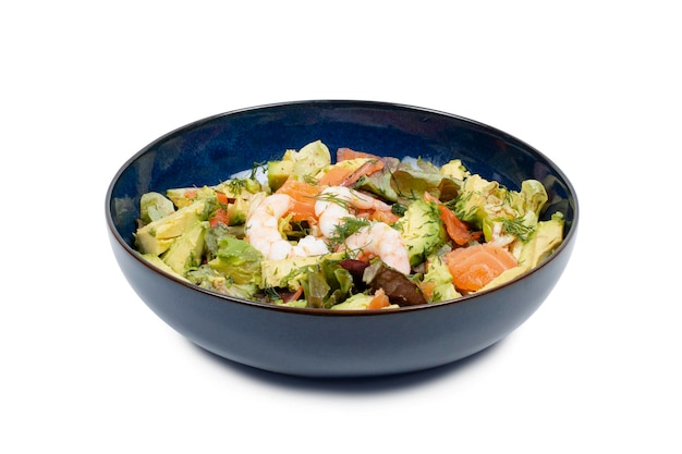 Avocado salmon shrimp salad in a blue plate on a white background