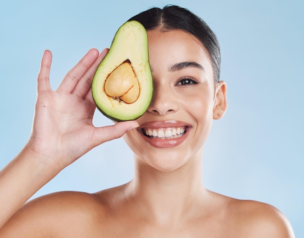 Avocado skincare beauty and clear skin routine for wellness and health with natural ingredients for glowing results Portrait smile and face of young model happy with organic spa treatment