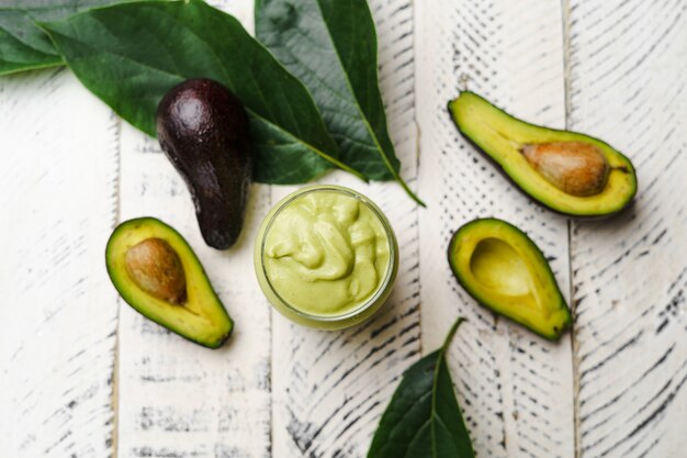 Avocado spinach and green smoothie healthy food white background