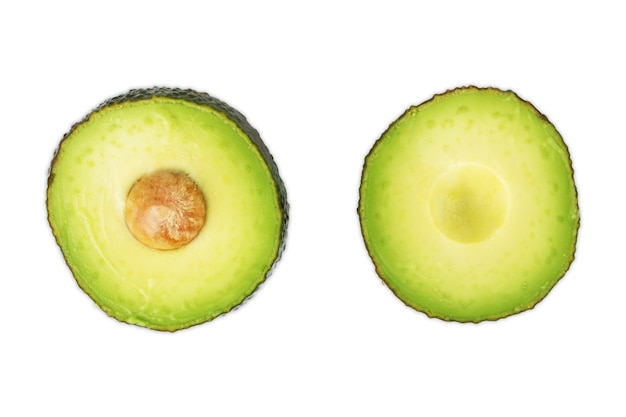 Avocado split in half isolated on a white background