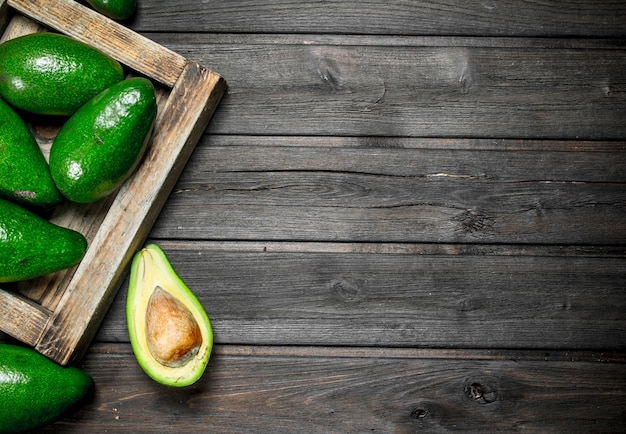 Avocado on a wooden dressing