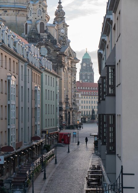 Awakening of the old city of Dresden Passersby in the early morning