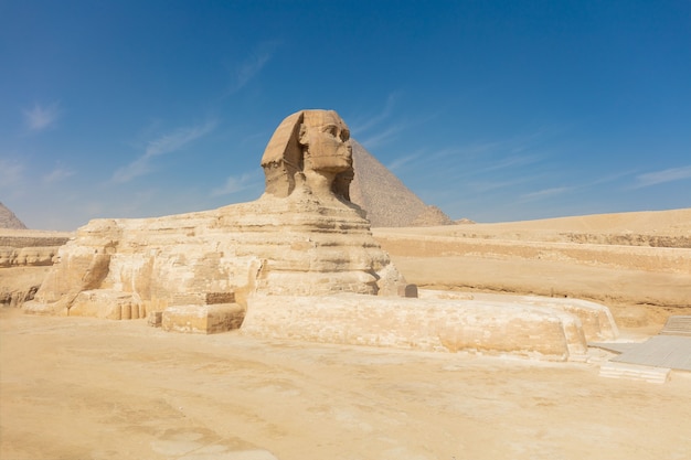 Awesome big old Sphinx pyramid in the middle of desert in Egypt.