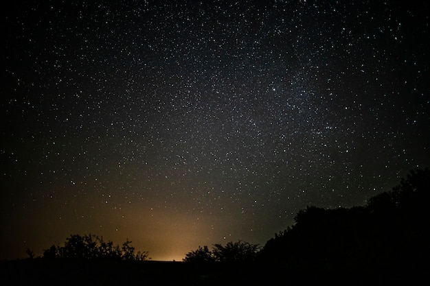 Awesome starry night sky with beam of light