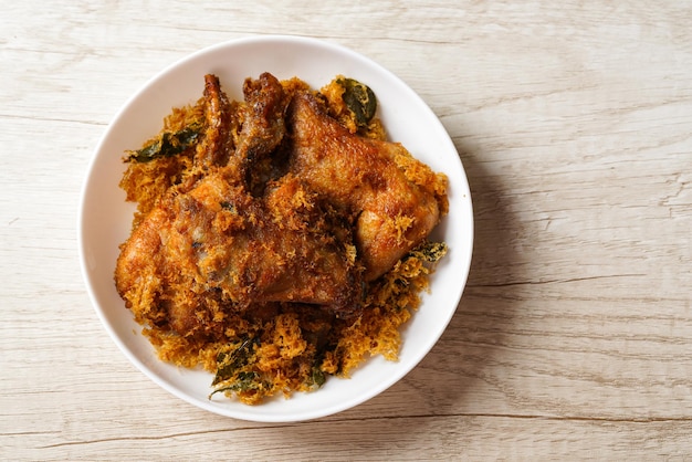 Ayam Goreng Padang. Traditional fried chicken with spice crumbs from Minangkabau, West Sumatra.