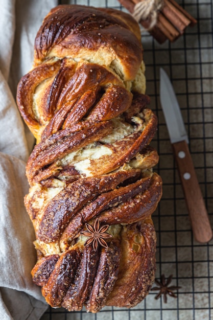 Babka or brioche bread with cinnamon and brown sugar Homemade pastry for breakfast