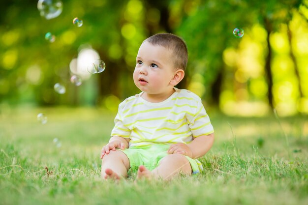 Baby boy on a walk in the park