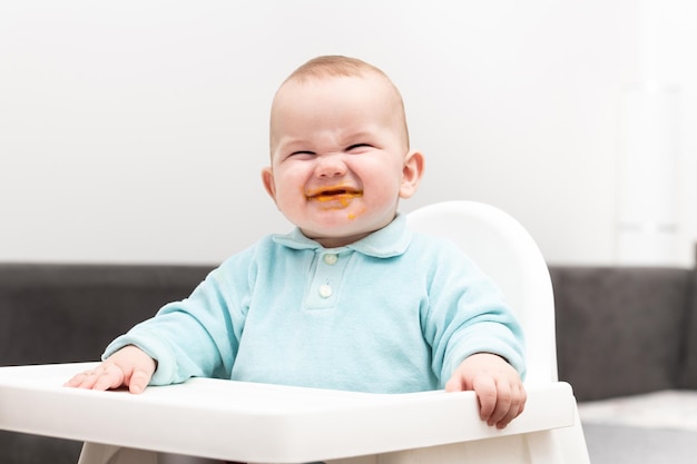 Baby Child Eating In Chair