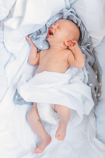 Baby crying in his crib