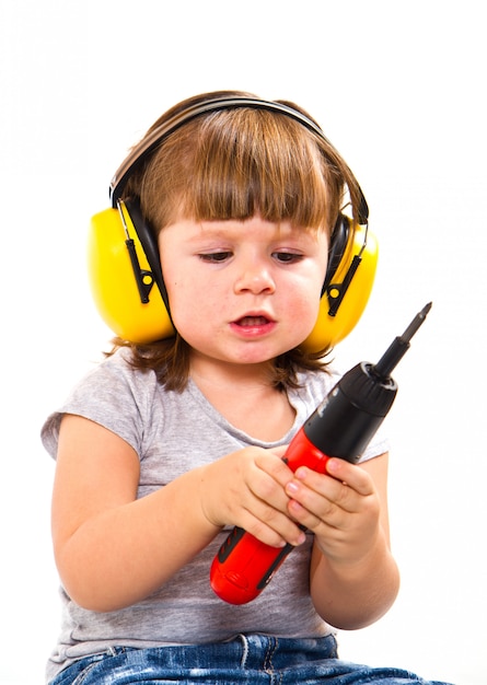 Baby girl with working tool