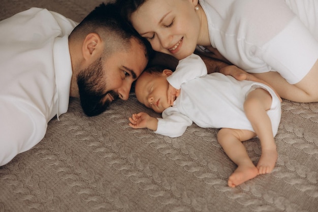 a baby is laying on the floor with the baby