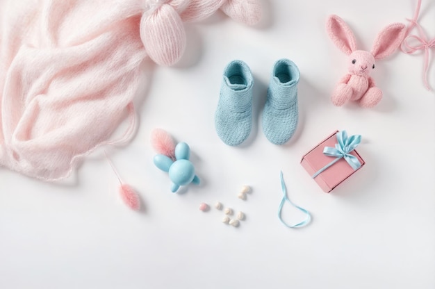 Photo baby items and toys flat lay on white background