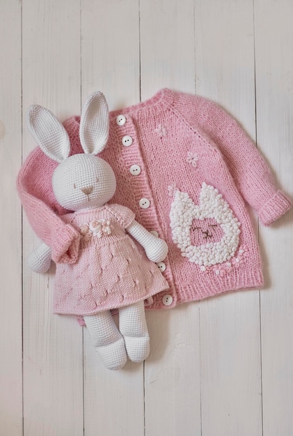 Baby knitted clothes and toys Handmade knitted clothes with embroidery