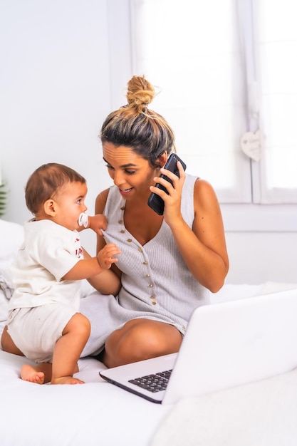 Baby less than a year learning the first lessons of her mother