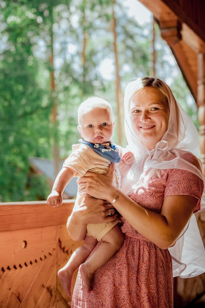 Baby in mother's arms in church