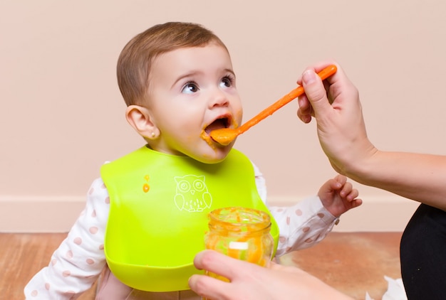 Baby and parents having lunch