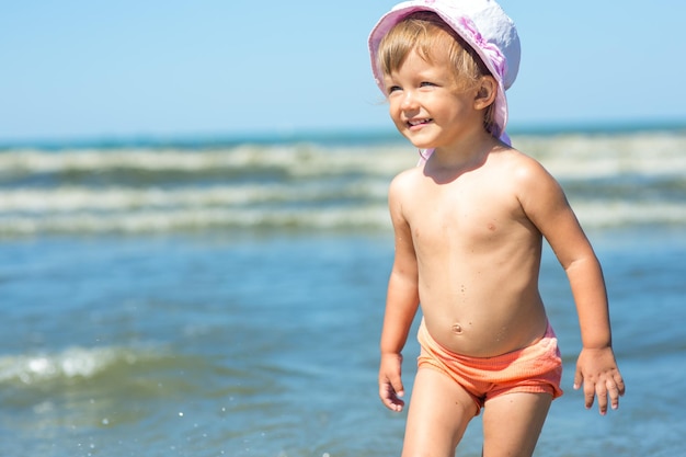 Baby playing on the beach