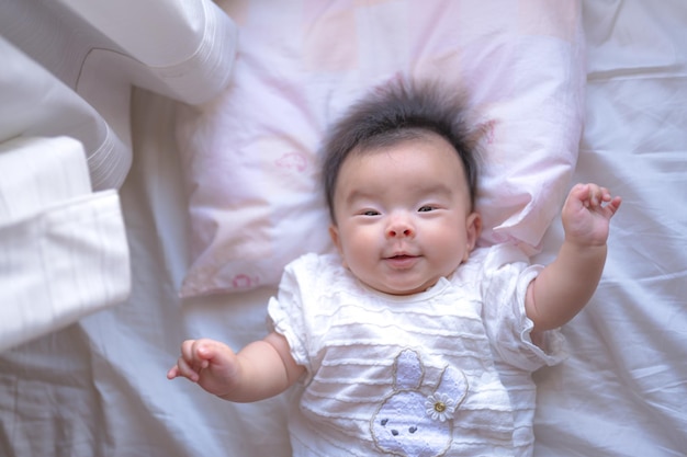 Baby playing with curtains