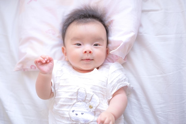 Baby playing with curtains