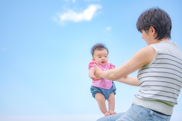 Baby practicing to stand