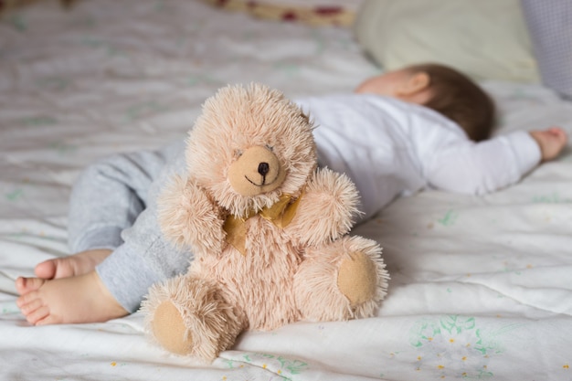 Baby sleeping in bed