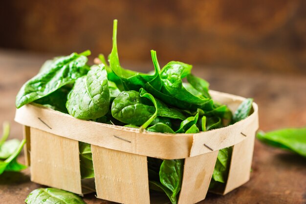 Baby spinach leaves in bowl 