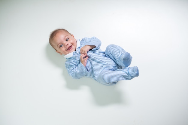 Baby in studio white isolated background