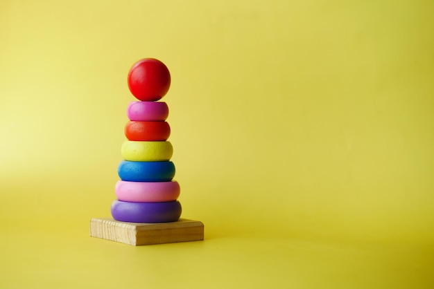 Baby toys on color background child development concept