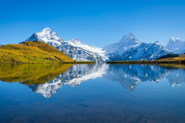 Bachalpsee Grindelwald Switzerland High mountains and reflection on the surface of the lake