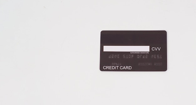 Back of Black Credit card on white background.