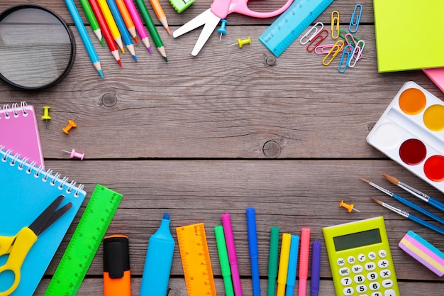 Back to school concept on grey wooden background