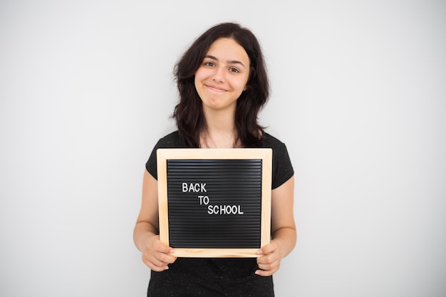 Back to school concept High school student smiling Happy teenager schoolgirl