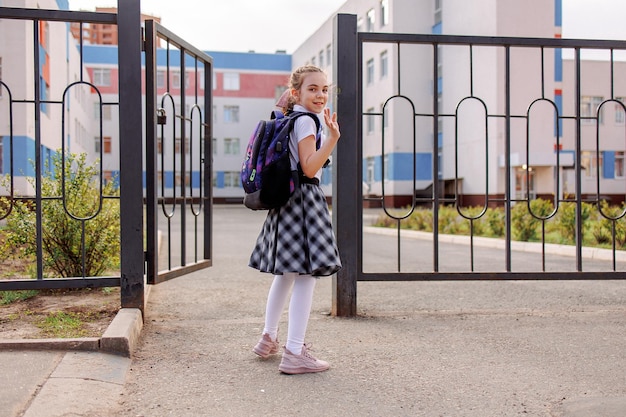 Back to school girl in school uniform go to school