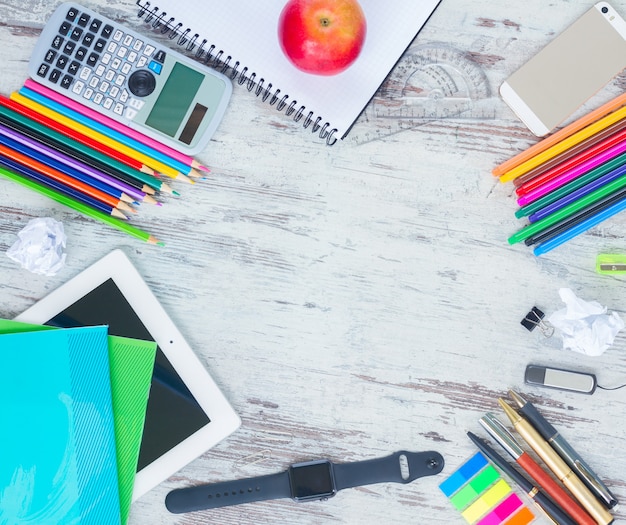 Back to school hero header with school supplies on wooden table