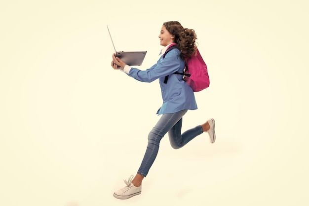 Back to school Teenager schoolgirl hold notebook laptop School children on isolated white studio 