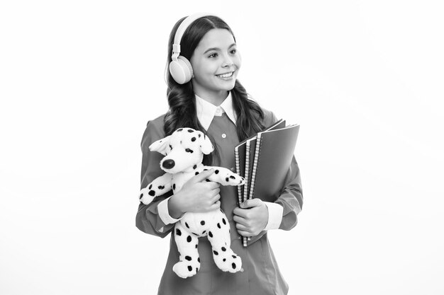 Back to school Teenager schoolgirl hold toy School children with favorite toys on isolated white studio background