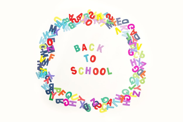 Back to school write with colored toy letters on a white background