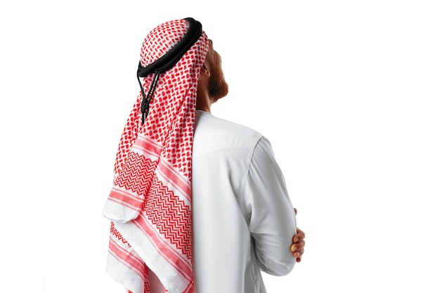 Back view of an Arab man standing on white isolated background