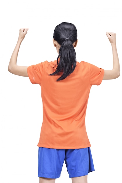 Back view of asian footballer woman with excited expression