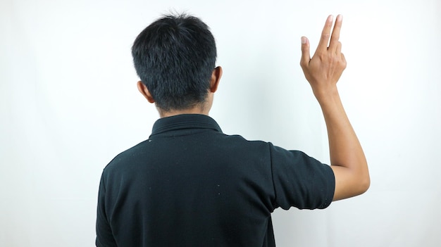 Back view of a man showing thumb up Rear view people collection backside view of person