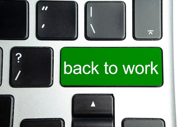 Back to work words on green keyboard button