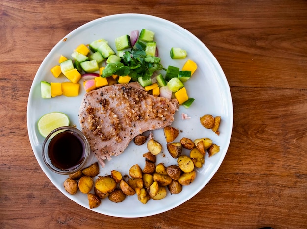 Backed potato with tuna steak