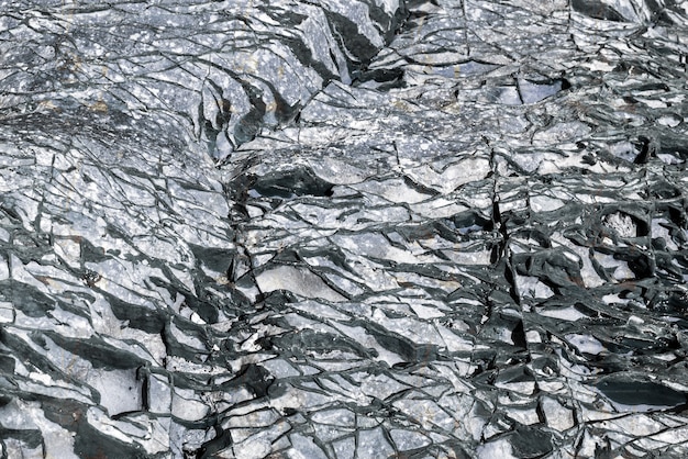 Background, abstract unique texture of the sea, stone on the shore. 